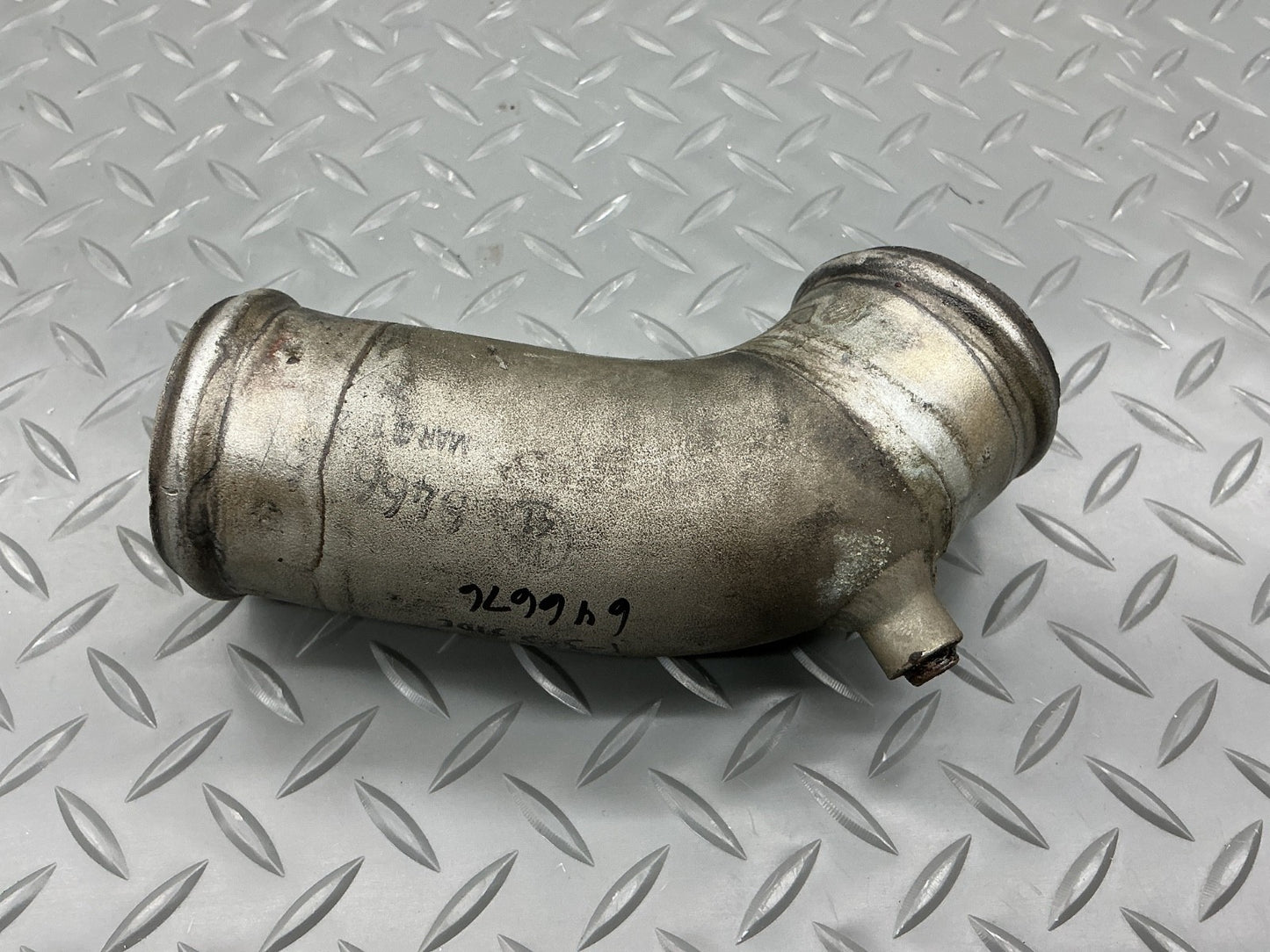P/N: 646676 TCM Intake Tube Elbow Cylinders 1-3-5 (AR) - for one