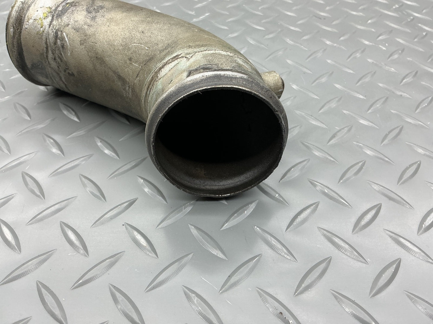 P/N: 646676 TCM Intake Tube Elbow Cylinders 1-3-5 (AR) - for one